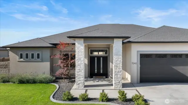 Stucco exterior with stone accents
