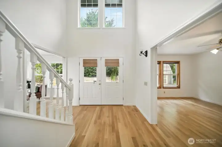 Beautiful authentic white oak floors will greet you upon entry and throught the home.Room to right has the potential to create a bedroom on the main. Doors are available for this option