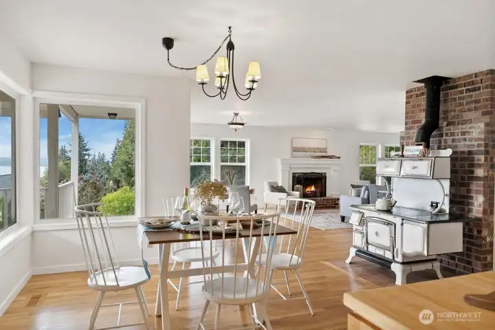 Eat in kitchen that is an open floor plan to main living and steps to large covered deck. The antique range actually works.