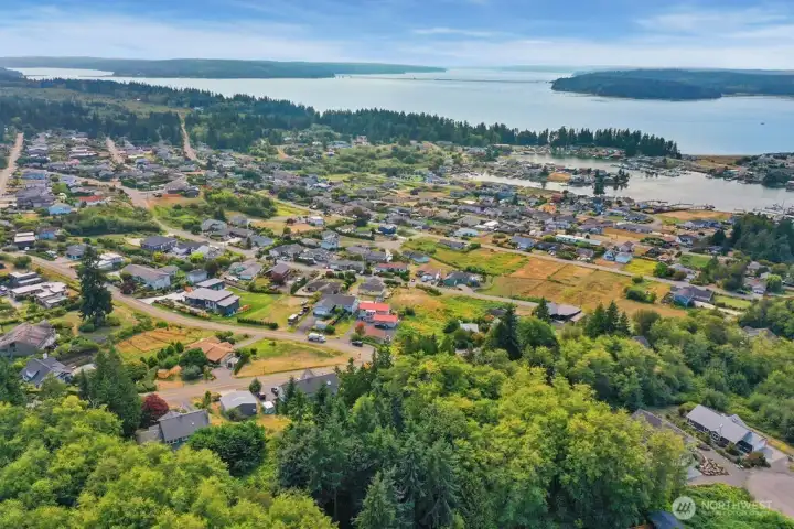 View from just above the home looking toward the community and Hood Canal and the bridge. Home is at lower left corner.