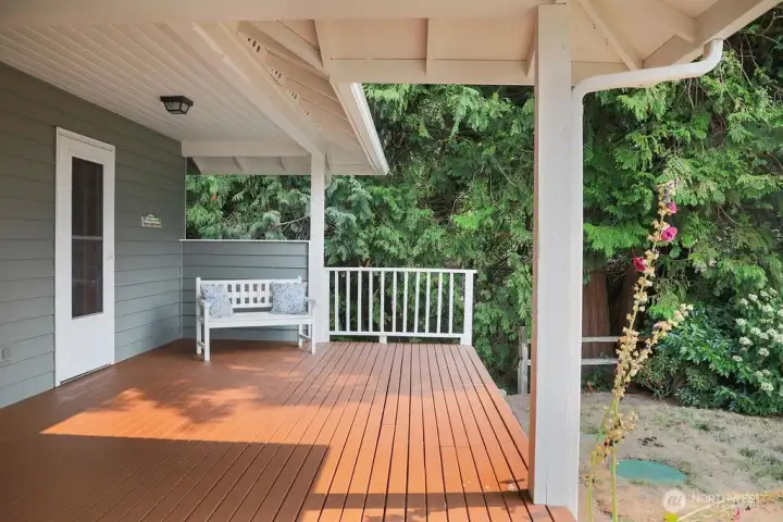 Freshly painted exterior and yet another  covered spot to kick back and take in the views.