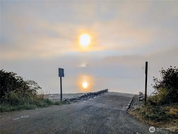 Sunrise on a foggy morning at the boat launch.