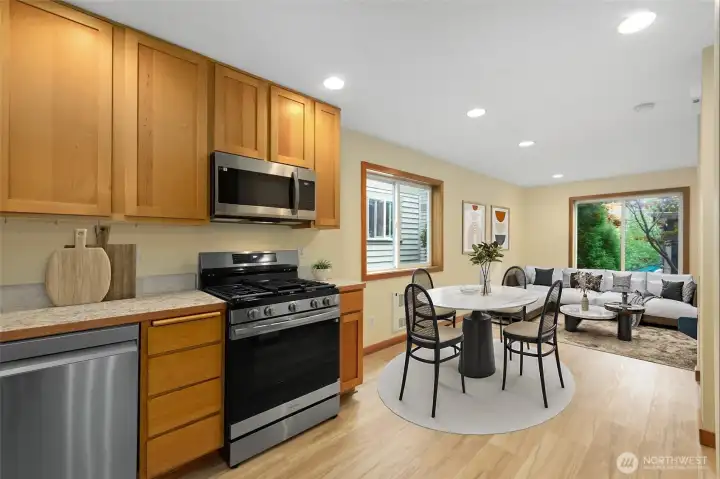 Great light throughout the living spaces in particular in the first half of the Day when the Sun shines through the large picture window facing East and reflects off the LVP flooring.
