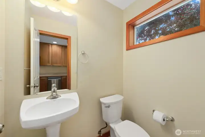 Half-Bath on the second floor just off the Kitchen.
