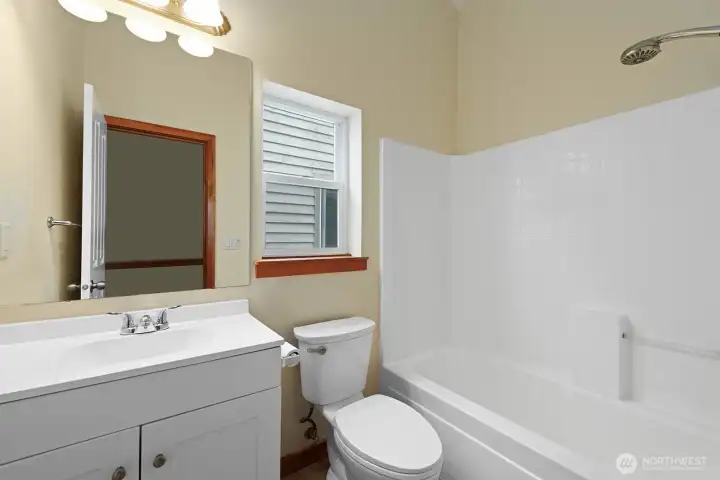 Full Bath upstairs with new vanity.   With this being an end-unit, even the Bath gets a Window.