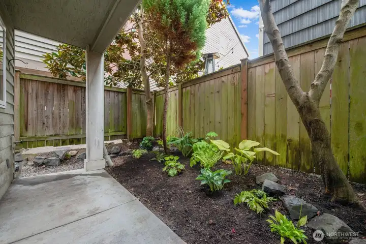 Private, fenced Patio with Plant Garden.