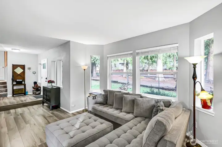 Large living room with bay window for added natural light.