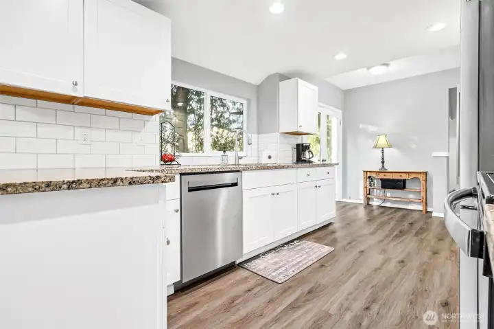 Light & bright, looking out to the trees, this is a wonderful kitchen.