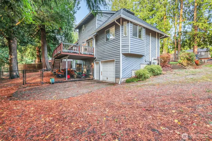 Access the 1.5 car garage by driving around to the back. Room for RV parking in the driveway