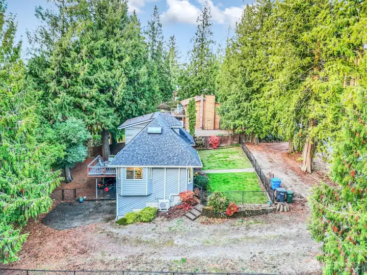 Plenty of yard space, driveway space plus a circular drive in the front.