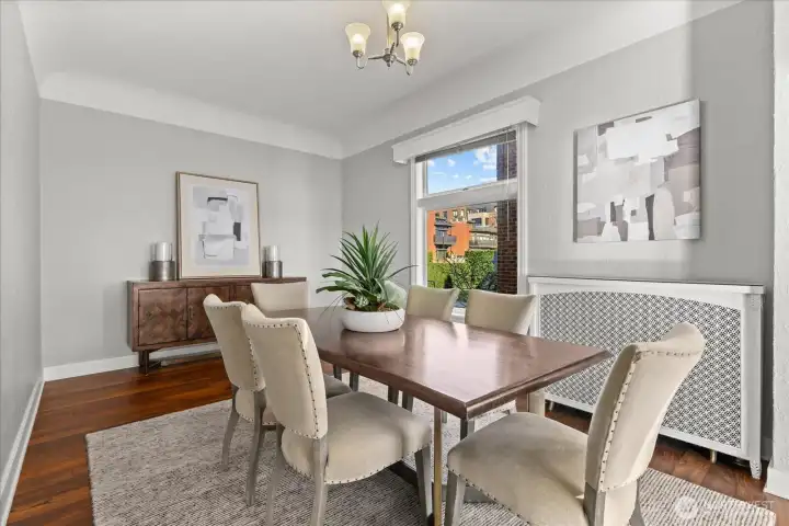 Generous formal dining room opens up to the main living room.