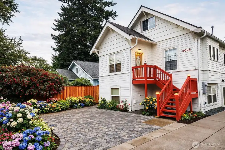 This exterior image includes virtual landscaping