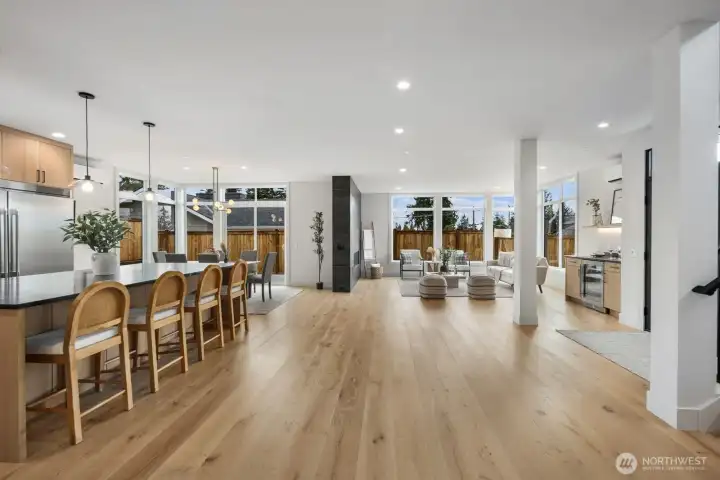 Wide open living spaces with tons of floor to ceiling windows, bring in the light