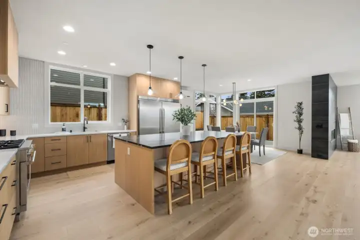 Open spacious light filled kitchens with adjacent eating area and sliders to the yard, great for barbecuing