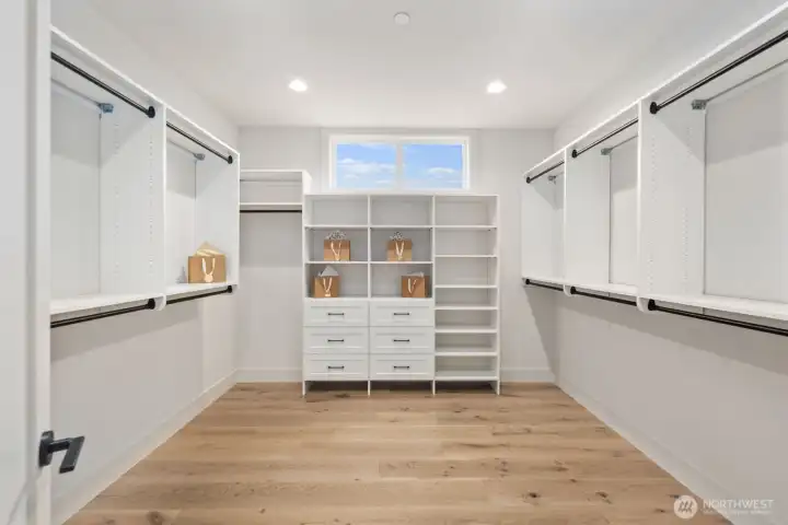 Walk in closet off of primary bedroom, 3 more bedrooms updstairs