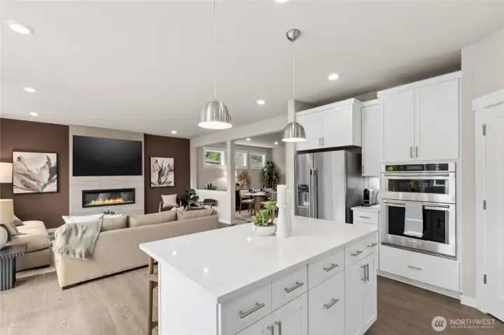 Open plan kitchen looks out to living area.  Photos are for representation purposes and differ per plan.
