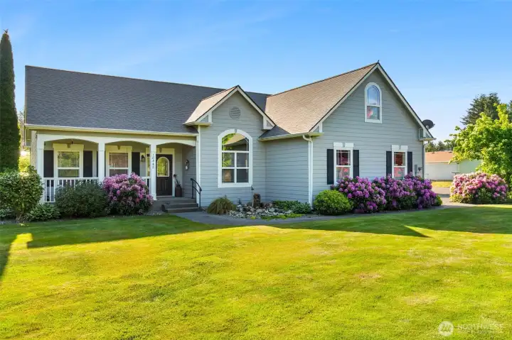 Welcome to 18442 Apricot Street SW in Rochester, WA. This charming, level, 1 acre property is framed with colorful blooms- rhododendrons, dogwoods, hydrangeas & Japanese maples, to name a few.
