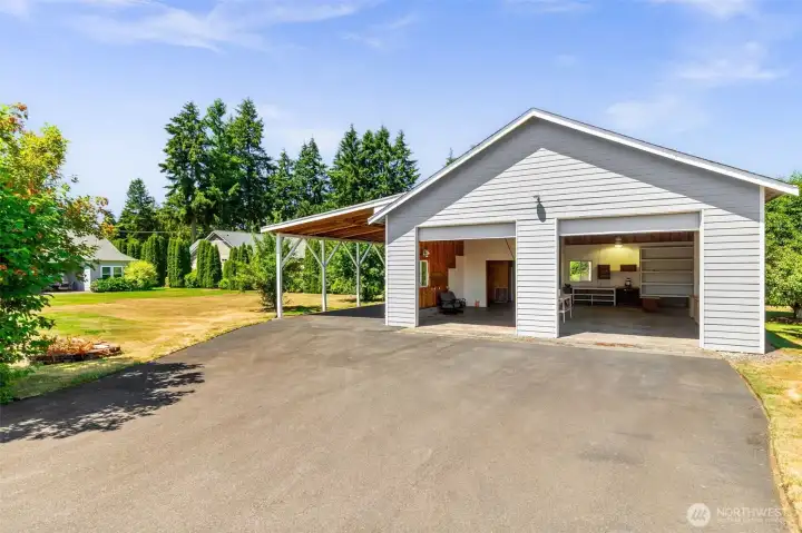 The 35'x39' SHOP features a large RV carport, (2) 12'x12' doors, loft, kitchenette, workbench and fabulous storage.  Solar panels (2015) on the roof help to significantly reduce energy costs.