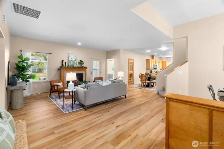 You'll love the newer LVP flooring, fresh interior paint, vaulted ceilings and thoughtful updates throughout the home.
