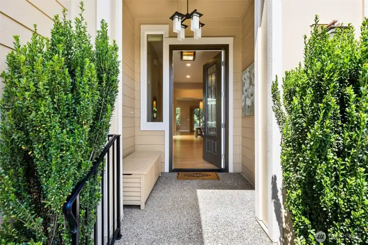 Covered front porch with high ceilings