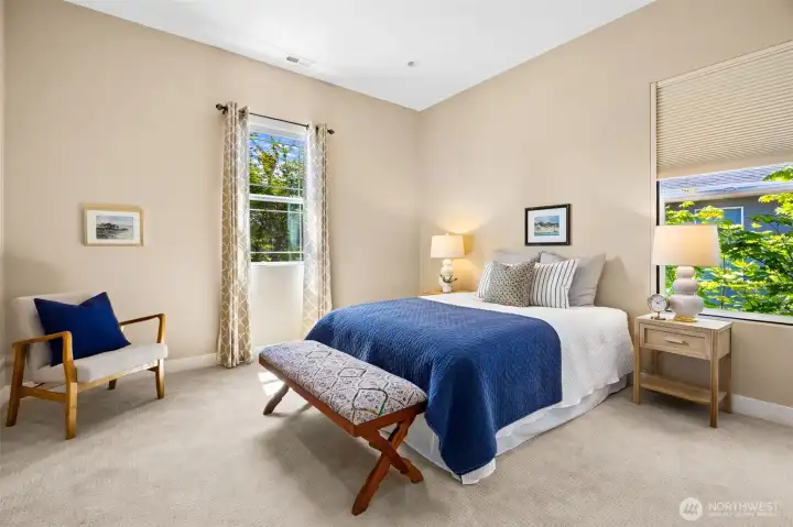Junior Guest Suite with 3/4 bathroom is conveniently located at opposite side of house.