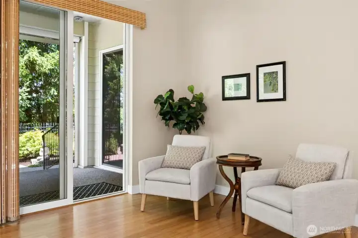 Sitting area off living room has access to the second, larger covered patio and can also be used as another dining area