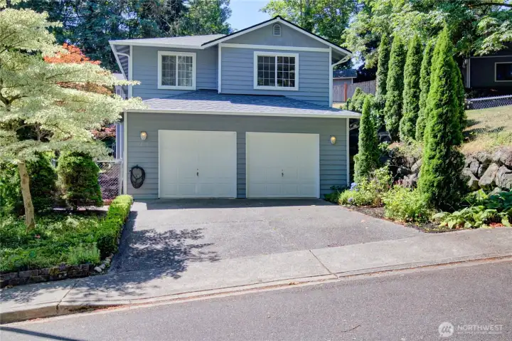 Lots of parking in driveway and oversized two car garage