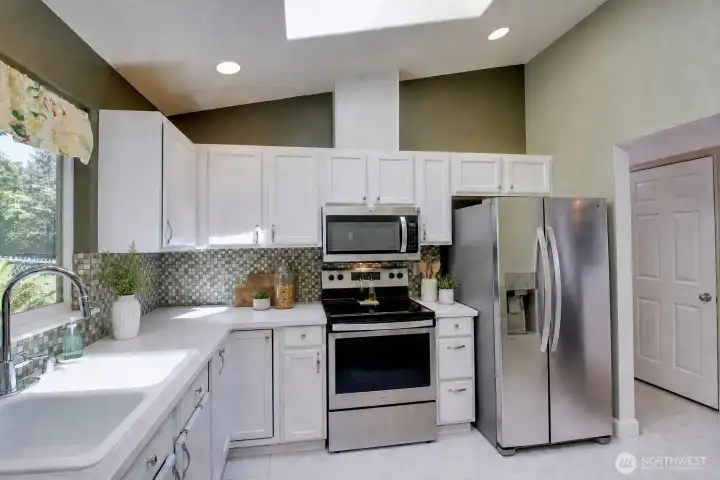 Light and bright kitchen with tons of cabinet