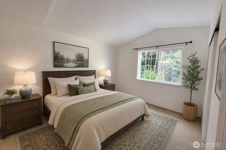 Primary Bedroom upstairs has been virtually staged