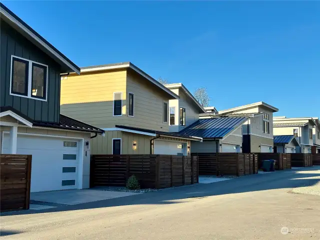 View of the alley and all garage facing homes.