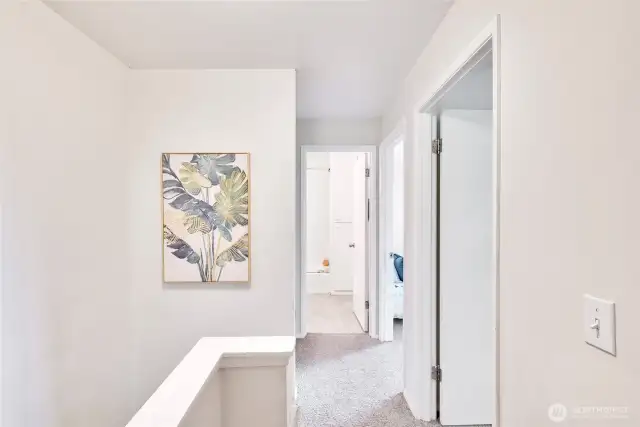 Upstairs has three spacious bedrooms and a full bath.