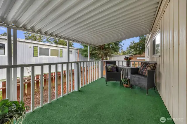 Covered 140 square foot deck at the entry increases the living space for some fresh air and entertaining guests.