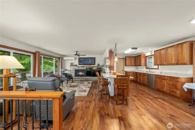 This house just feels friendly and open with the living room that looks through to the living room and out the windows to the Trex deck and gorgeous views.