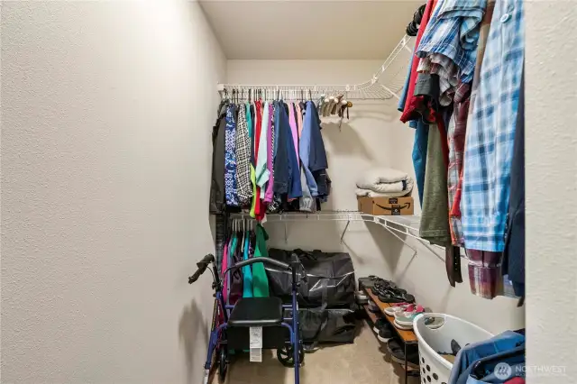 Walk-in primary closet on main floor.