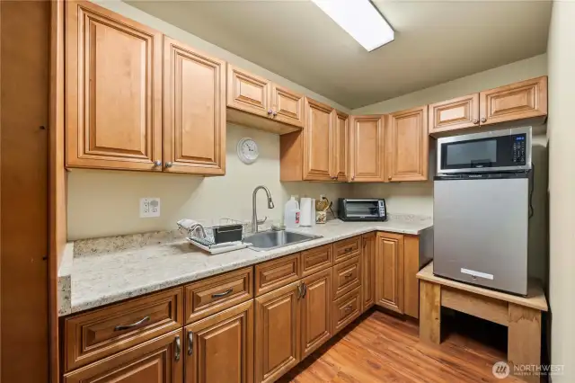 Efficient kitchen in the ADU upstairs in the barn.