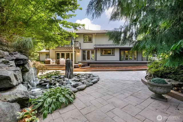 Back of home with fountain