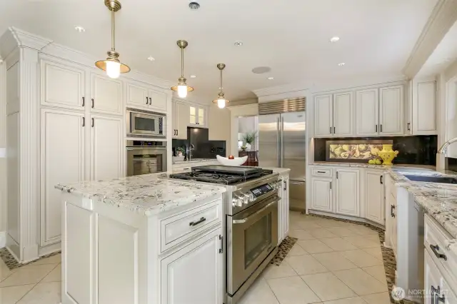 Kitchen island with Dacor gas stove and oven