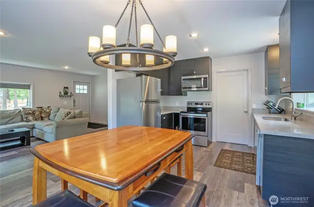 From the dining area, enjoy a seamless connection to the kitchen.