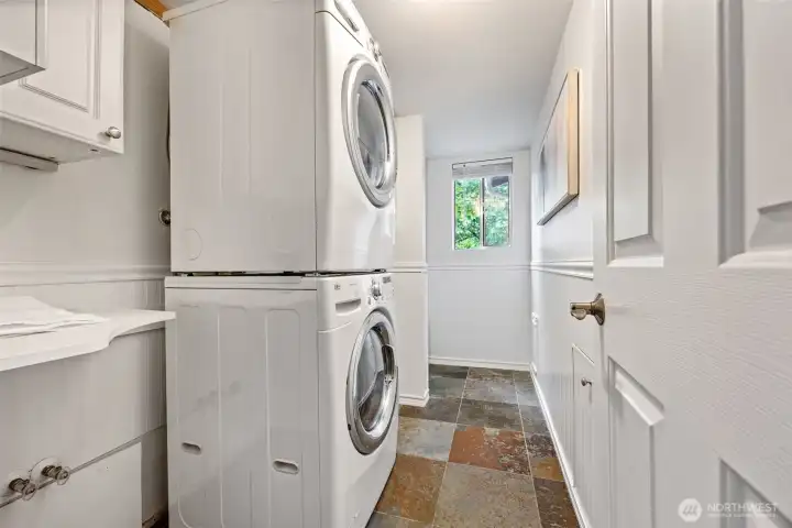 Utility room on lower level and half bath.
