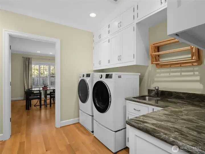 Spacious Laundry opens to the spare bedroom or craft room