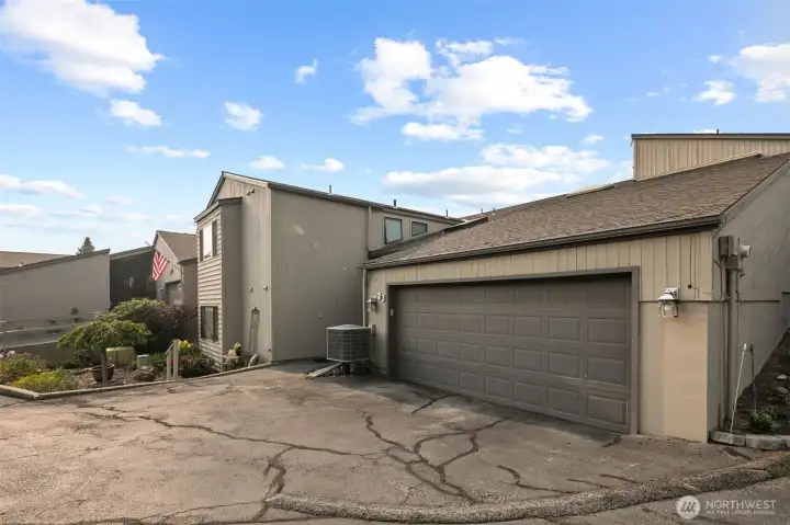 Private 2 car garage in this condo community.