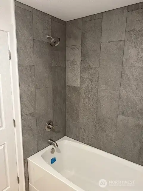 Tile looks so Great, goes right up to the ceiling!