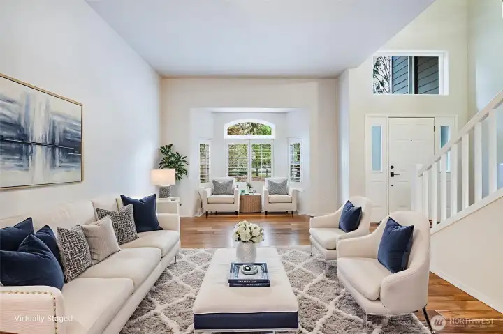 enteranceThe elegant formal living room greets you upon entry, providing a sophisticated space perfect for receiving guests. This room flows seamlessly into the dining area and den.