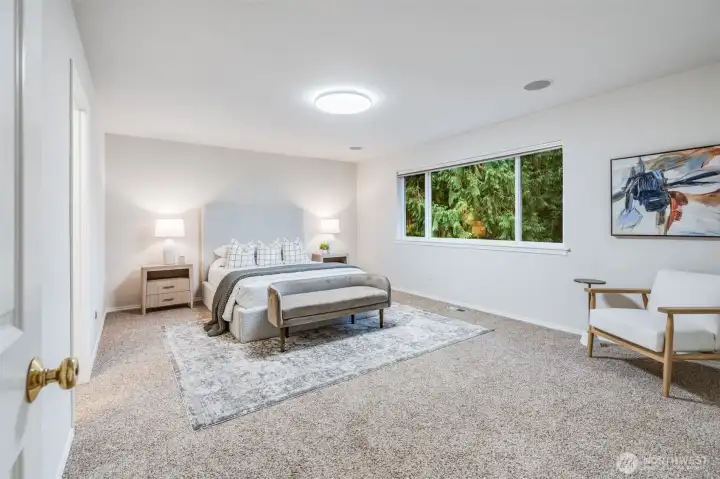 A serene and spacious master suite offering a private retreat