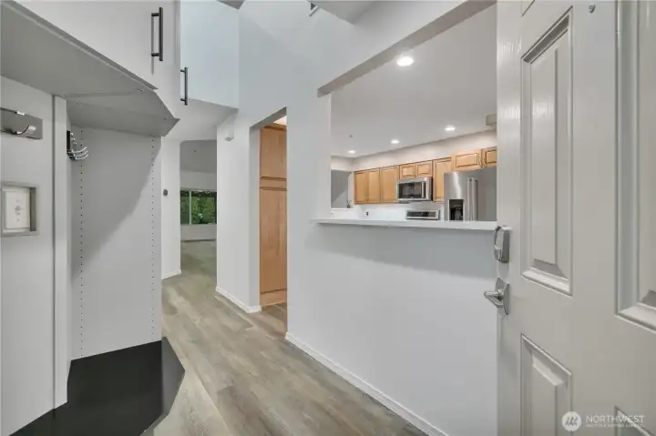 Entry way with built ins for storage, bench, coat rack