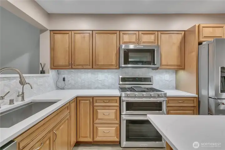 Upgraded Stainless Steel Kitchen Aid Appliances with double oven and gas range