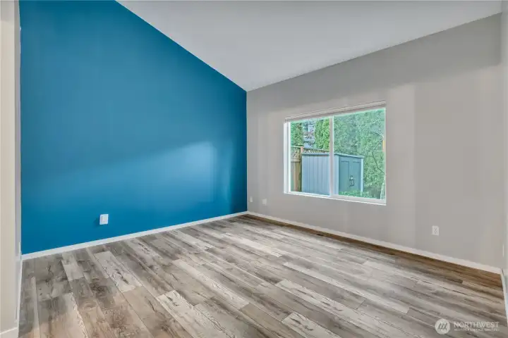 Primary Suite with view of gardens outside