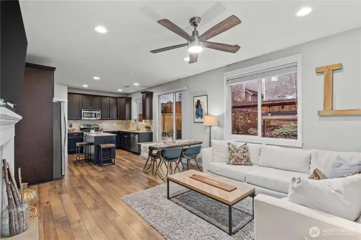 Enter into your open concept living, dining, and kitchen space downstairs