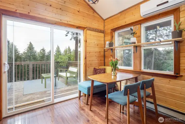 Dining area opens to upper level deck