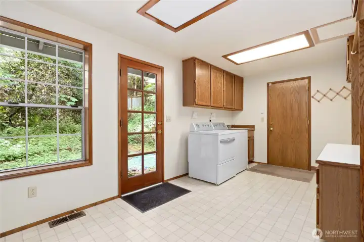 Large main floor utility room just off the garage